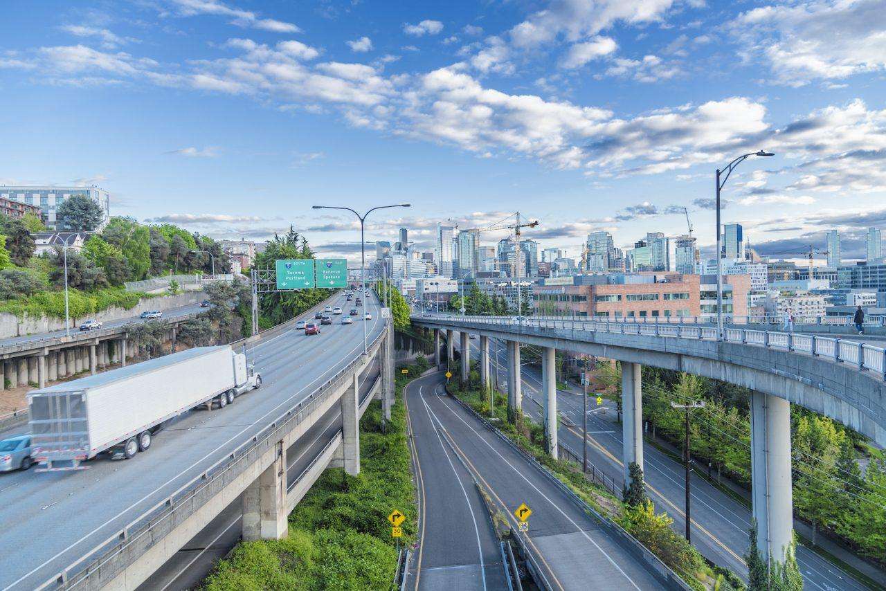 interstate-trucking-industry-highway-running-through-city-1.jpg